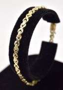 Beautiful X and O Bracelet in 10K Yellow Gold