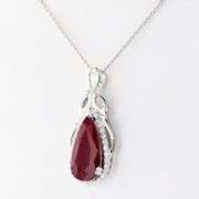PLATINUM RUBY AND DIAMOND PENDANT 4.06 C.T.W.