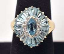 Tasteful Topaz and Diamond Ring in 10K Yellow Gold