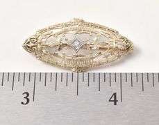 Dazzling Diamond Pin in 10K Yellow Gold