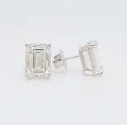Stunning Certified 7.13CTW Emerald Cut Diamond Studs