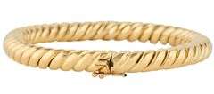 Italian 6.50MM Polished Twisted Oval Bangle Bracelet in 18K