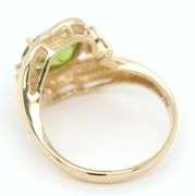 14kt Yellow gold oval Peridot and diamond accent ring