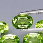Dazzling 4.28ct untreated apple green Peridot set