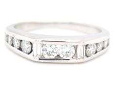 14kt White gold 0.58ctw baguette and round diamond band