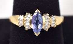 A Ravishing Tanzanite and Diamond Ring in 14K Yellow Gold