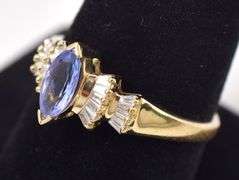 A Ravishing Tanzanite and Diamond Ring in 14K Yellow Gold