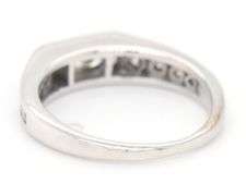 14kt White gold 0.58ctw baguette and round diamond band