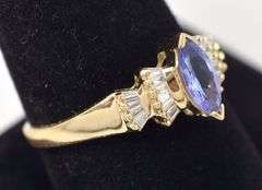 A Ravishing Tanzanite and Diamond Ring in 14K Yellow Gold