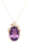 18kt Yellow gold oval Amethyst with diamond around pendant on chain