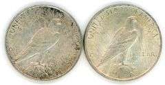 2 1922 Peace Silver Dollars in VG