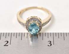 Elegant Topaz and Diamond Ring in 14K Yellow Gold