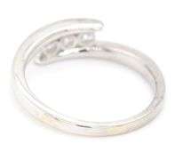 14kt White gold 0.35ctw 3 stone diamond bypass band