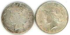 2 1922 Peace Silver Dollars in VG
