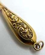 Vintage Filigree Opera Glass Pendant in 14k Gold. Extremely collectable.