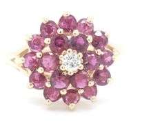 14kt Yellow gold ruby and diamond cluster ring