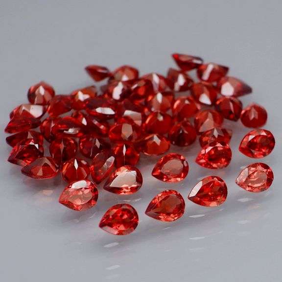 Premium 9.52ct pear cut cherry red Garnet set
