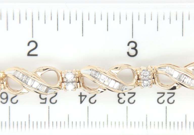 10kt Yellow gold 1.50ctw baguette and round diamond bracelet