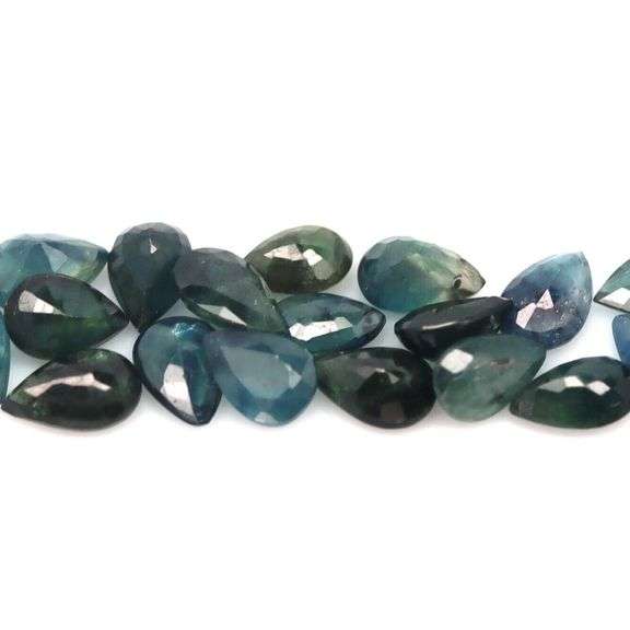 Heated only! 8.65ct greenish blue sapphire set