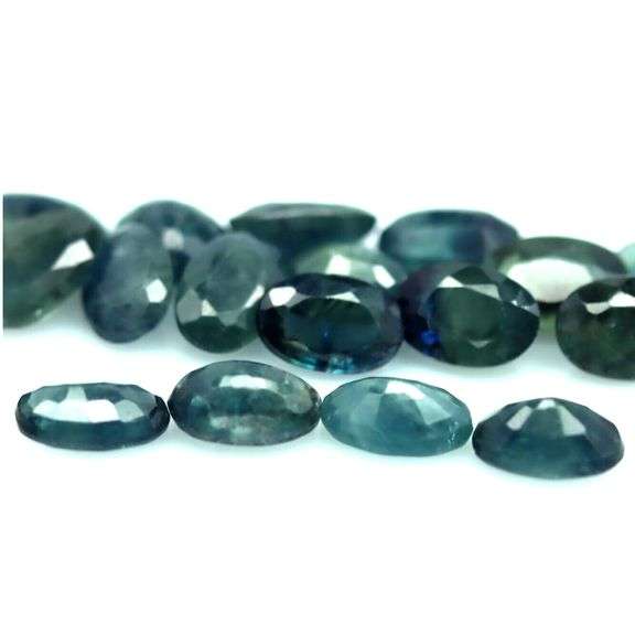 Heated only! 10.52ct blue green Sapphire set