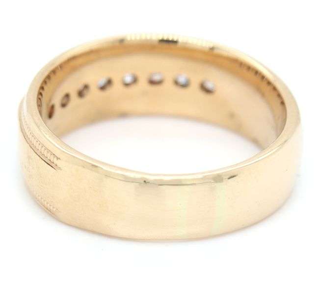 14kt Yellow gold 0.50ctw eight diamond channel set Milgrain band