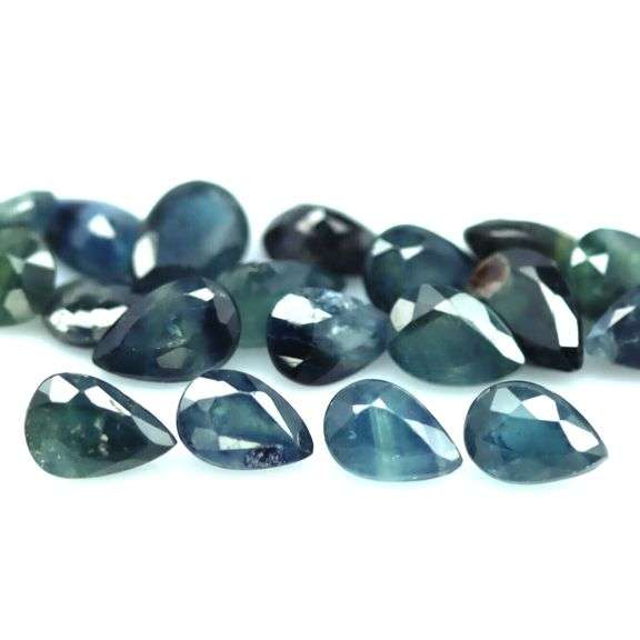Heated only! 11.16ct blue green Sapphire set