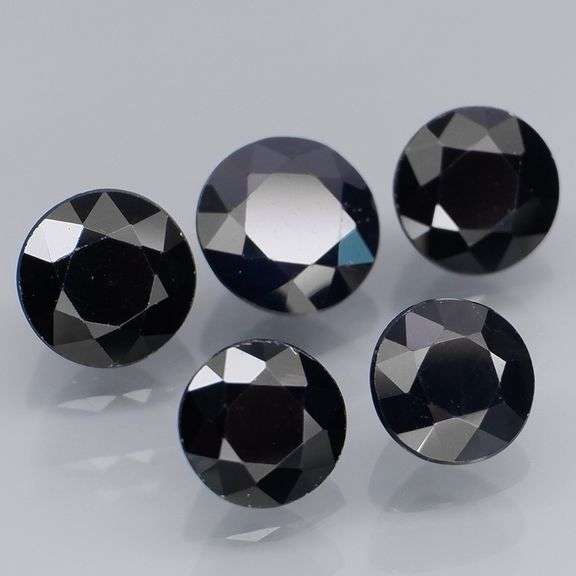 Heated Only! 6.24ct midnight blue Sapphire set