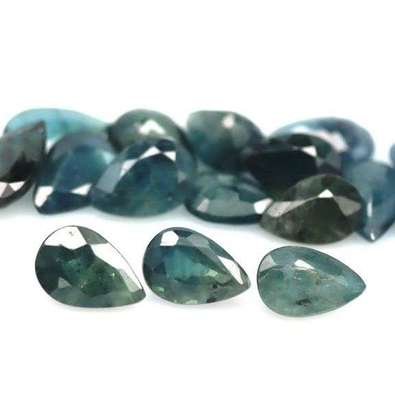 Heated only! 8.65ct greenish blue sapphire set