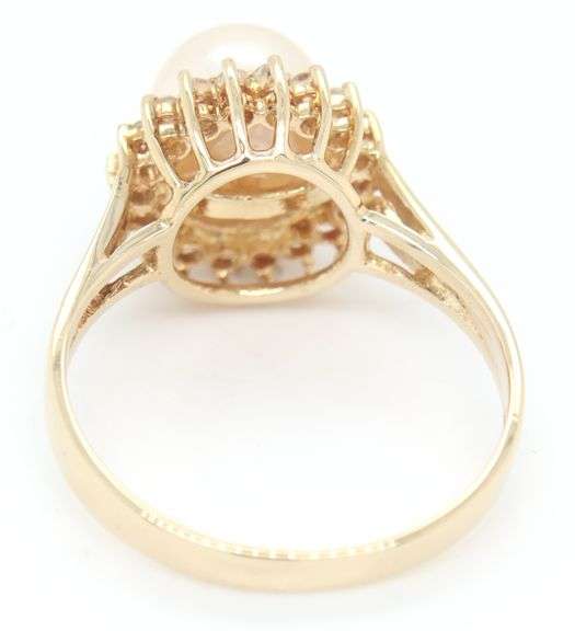 14kt Yellow gold 7.5mm Akoya pearl and diamond halo ring