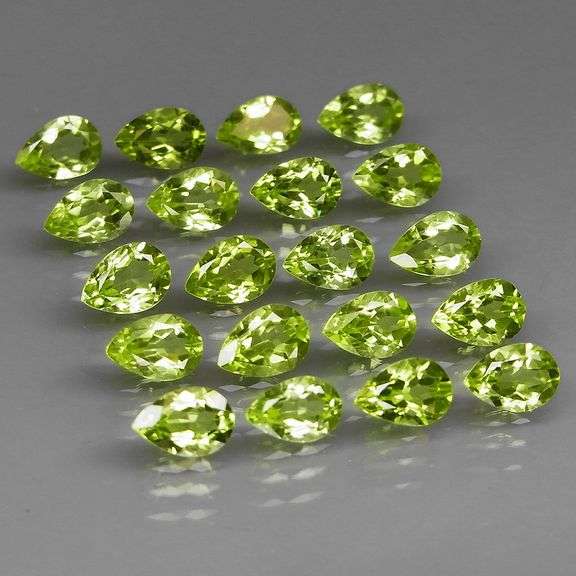 Fantastic 8.59ct 6x4mm pear cut Peridot set