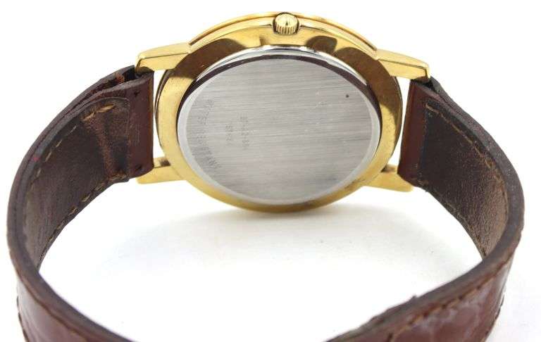 Movado Museum gold plated quartz white dial watch