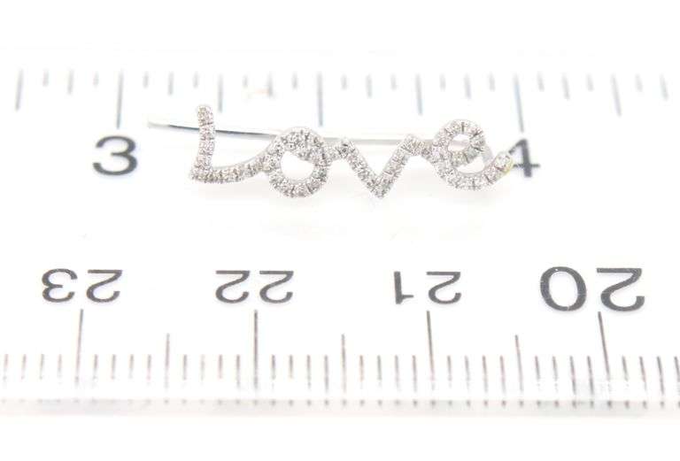 14kt White gold diamond Love ear climber