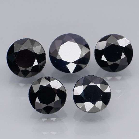 Heated Only! 6.24ct midnight blue Sapphire set