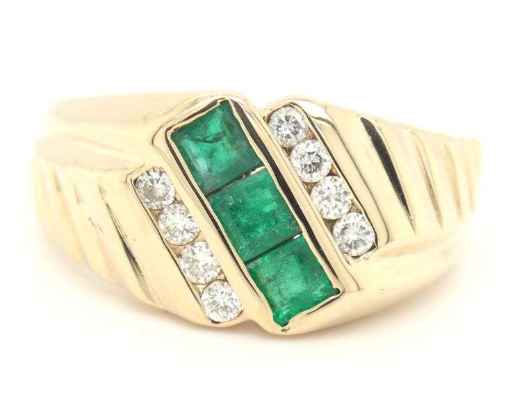 14kt Yellow gold 0.57ctw square emerald and 0.25ctw channel set diamond ring