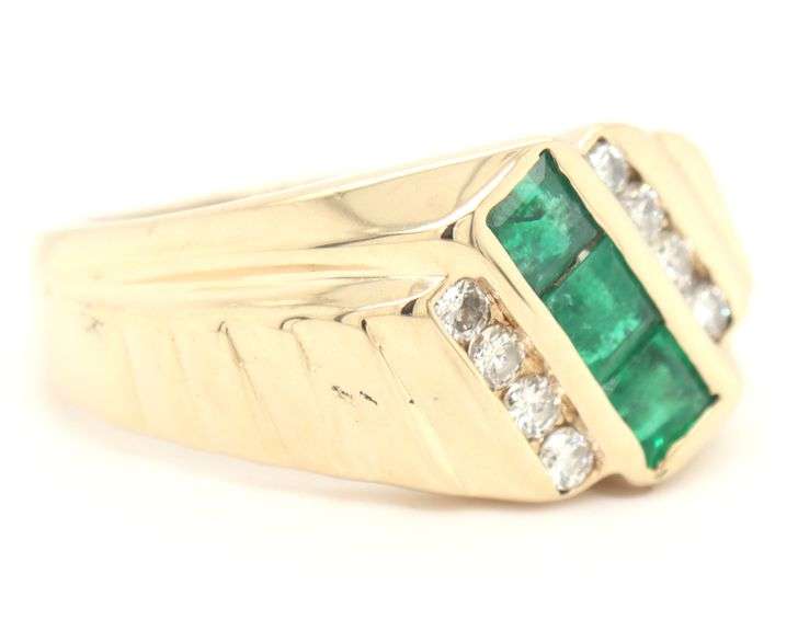 14kt Yellow gold 0.57ctw square emerald and 0.25ctw channel set diamond ring