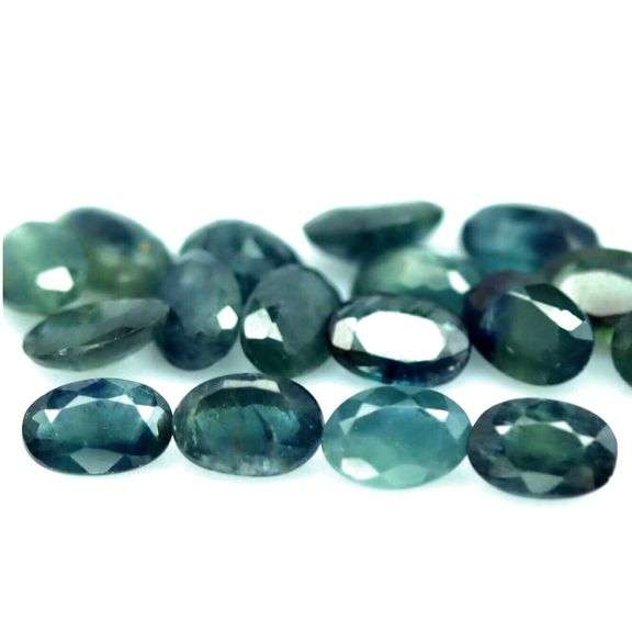 Heated only! 10.52ct blue green Sapphire set