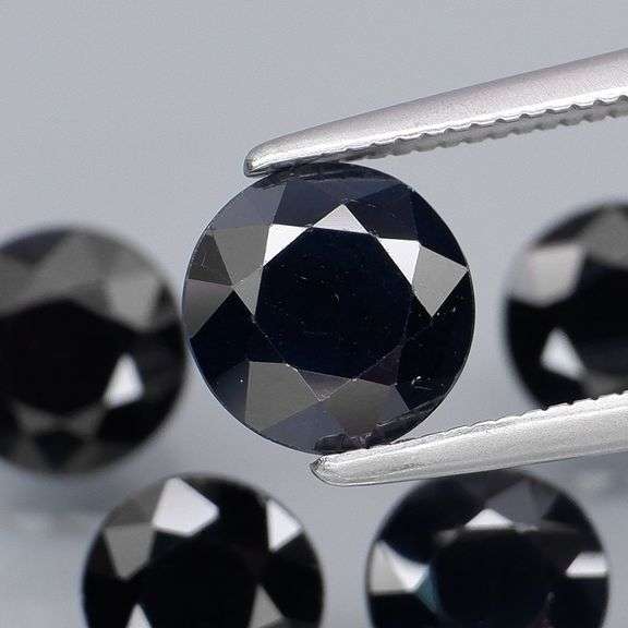 Heated Only! 6.24ct midnight blue Sapphire set