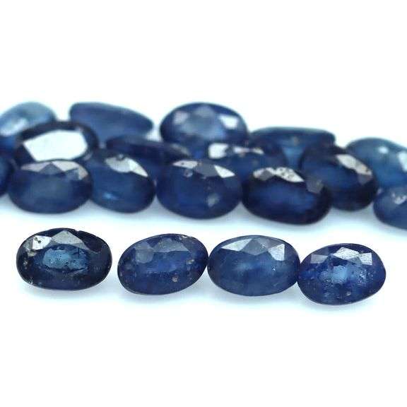 Richly colored 7.10ct ink blue Sapphire set from Madagascar