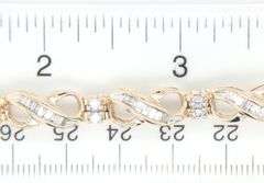 10kt Yellow gold 1.50ctw baguette and round diamond bracelet