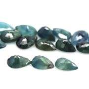 Heated only! 8.65ct greenish blue sapphire set