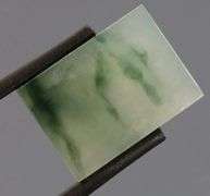 Outstanding 19.30ct swirling Jadeite Jade cabochon