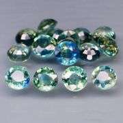 Stunning blue green 3.76ct round cut Sapphire set