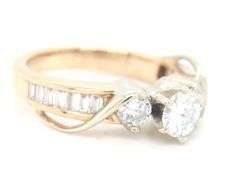 14kt Yellow gold 1ctw round brilliant cut in baguette diamond engagement ring