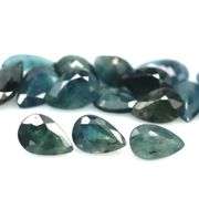 Heated only! 8.65ct greenish blue sapphire set