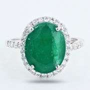 PLATINUM EMERALD AND DIAMOND RING 6.67 C.T.W.