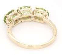 9kt Yellow gold oval Peridot and diamond accent ring