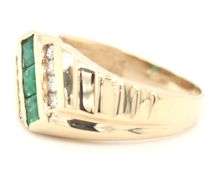 14kt Yellow gold 0.57ctw square emerald and 0.25ctw channel set diamond ring