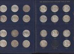 Complete Choice to Gem BU 35-pc set of Franklin Half Dollars in album and 2 PCGS slabs