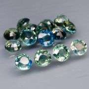 Stunning blue green 3.76ct round cut Sapphire set