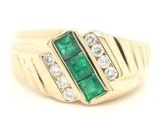 14kt Yellow gold 0.57ctw square emerald and 0.25ctw channel set diamond ring